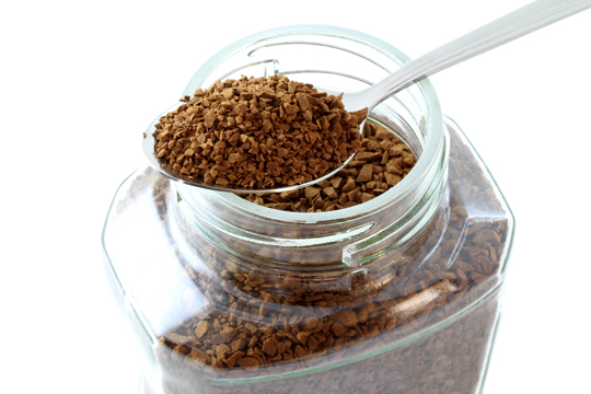 Instant coffee over fresh brewed coffee grounds