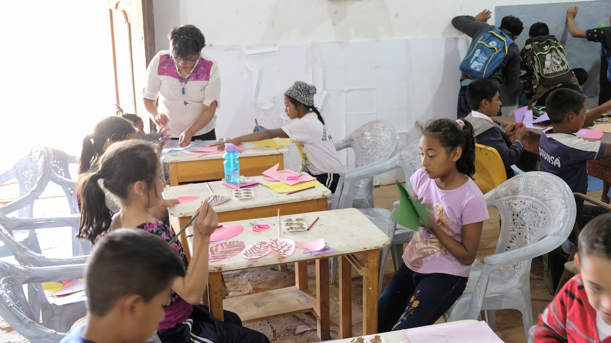 Children in Honduras doing art