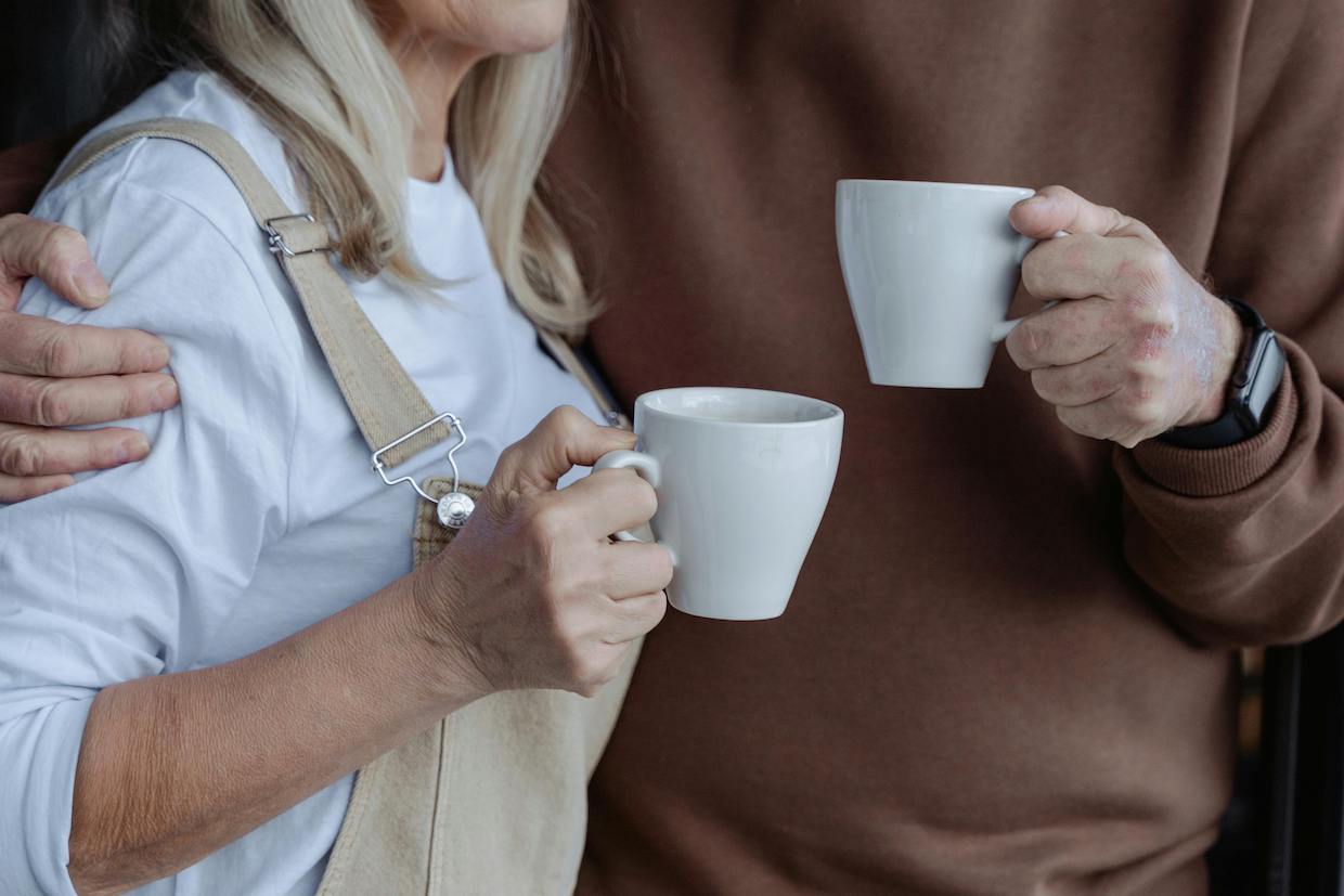 older people drinking coffee