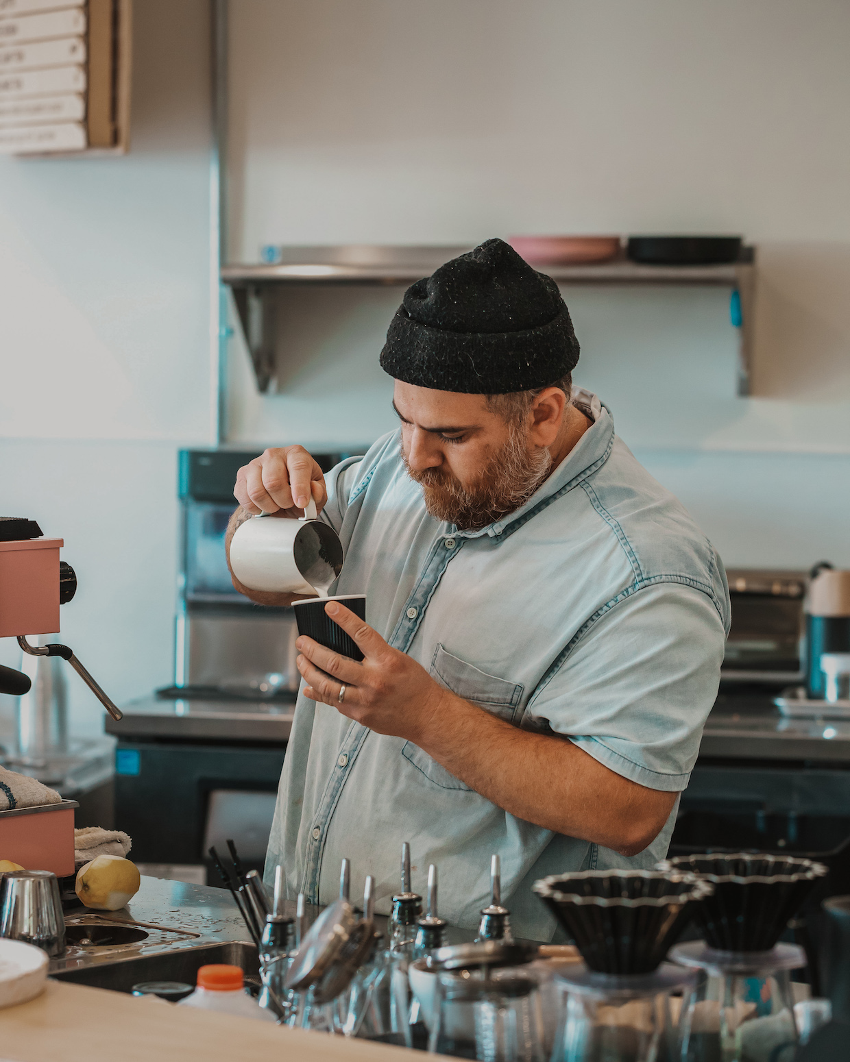 2 Necessity Coffee Roasters barista