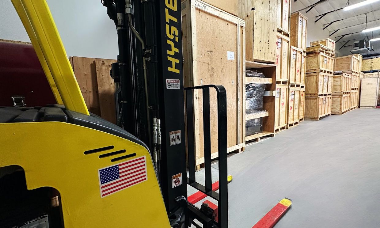 Showroom Photos – Showroom – Forklift and crates